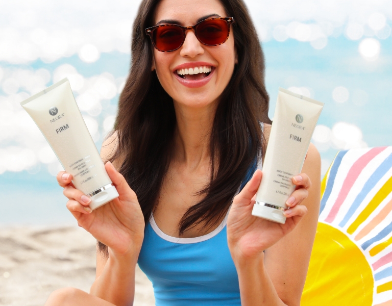 Woman smiling and holding Neora’s best-selling Firm Body Contour Cream 2-Pack—save up to $47 this month only.